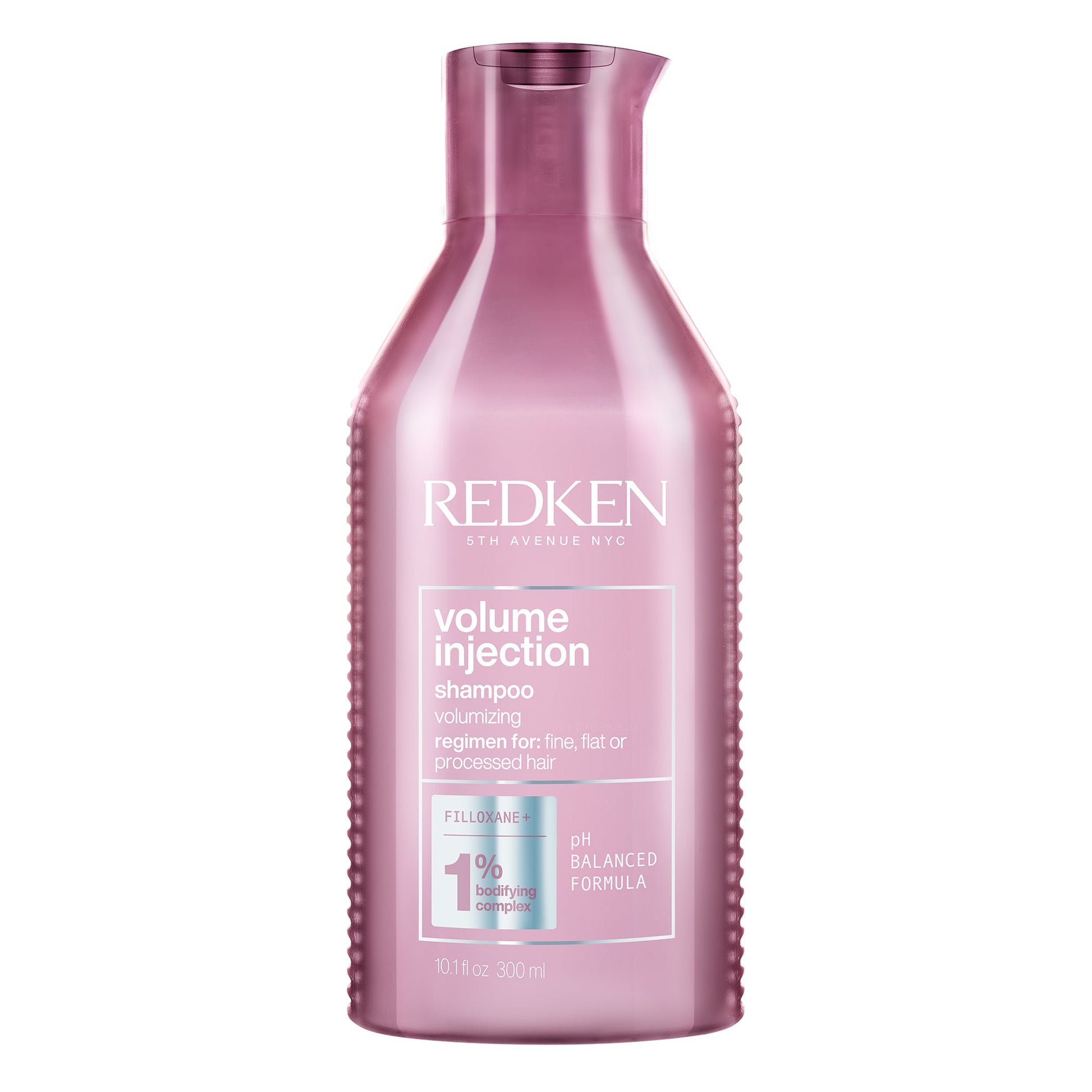 A bottle of Redken Volume Injection Shampoo, which is pink in color and has the brand and product name displayed on the label.